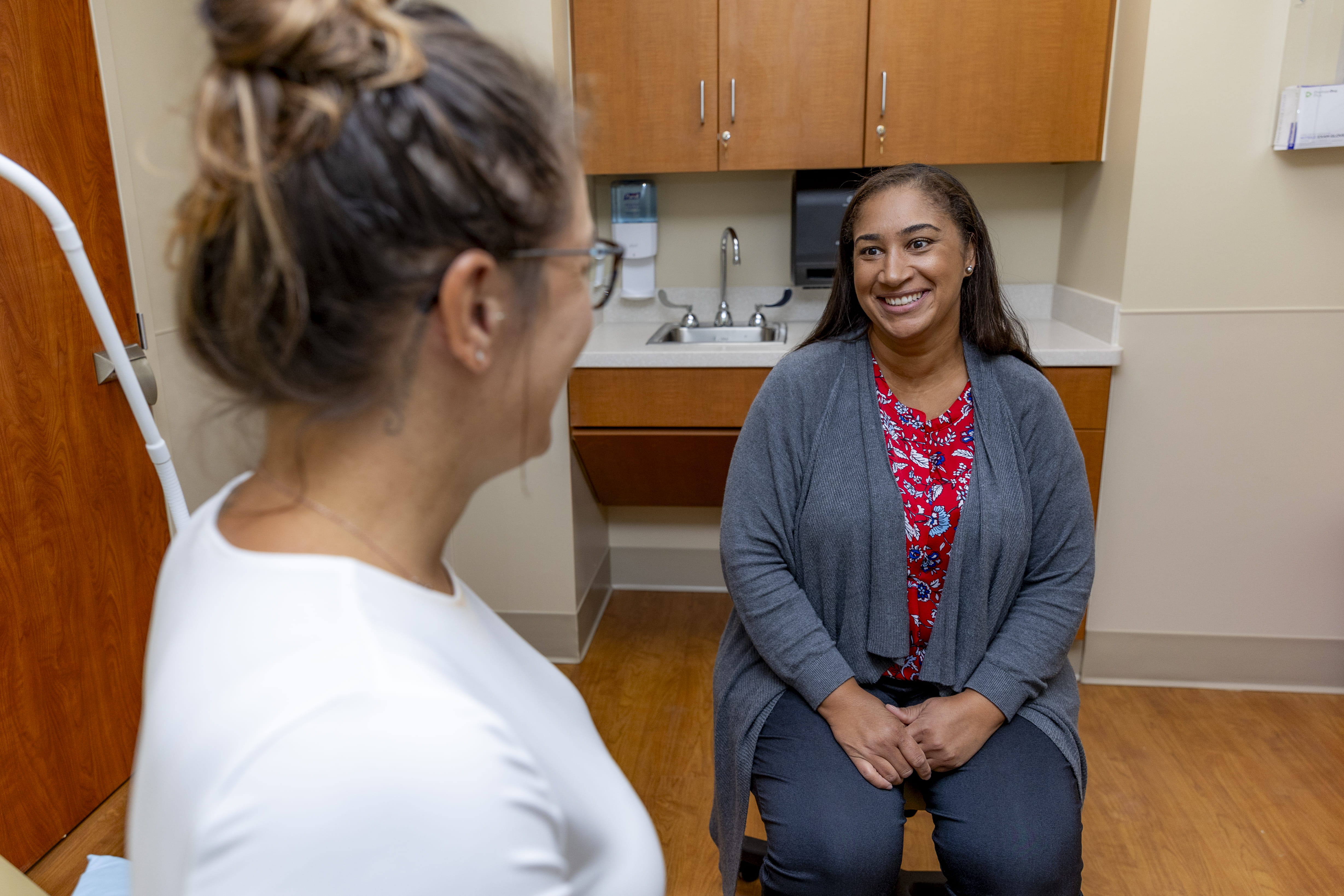 Woman of color in health clinic