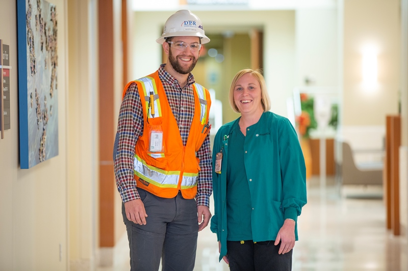 Image of construction staff and hospital staff