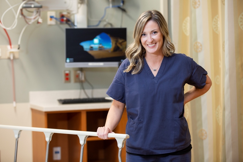 Hospital staff standing in newly renovated room