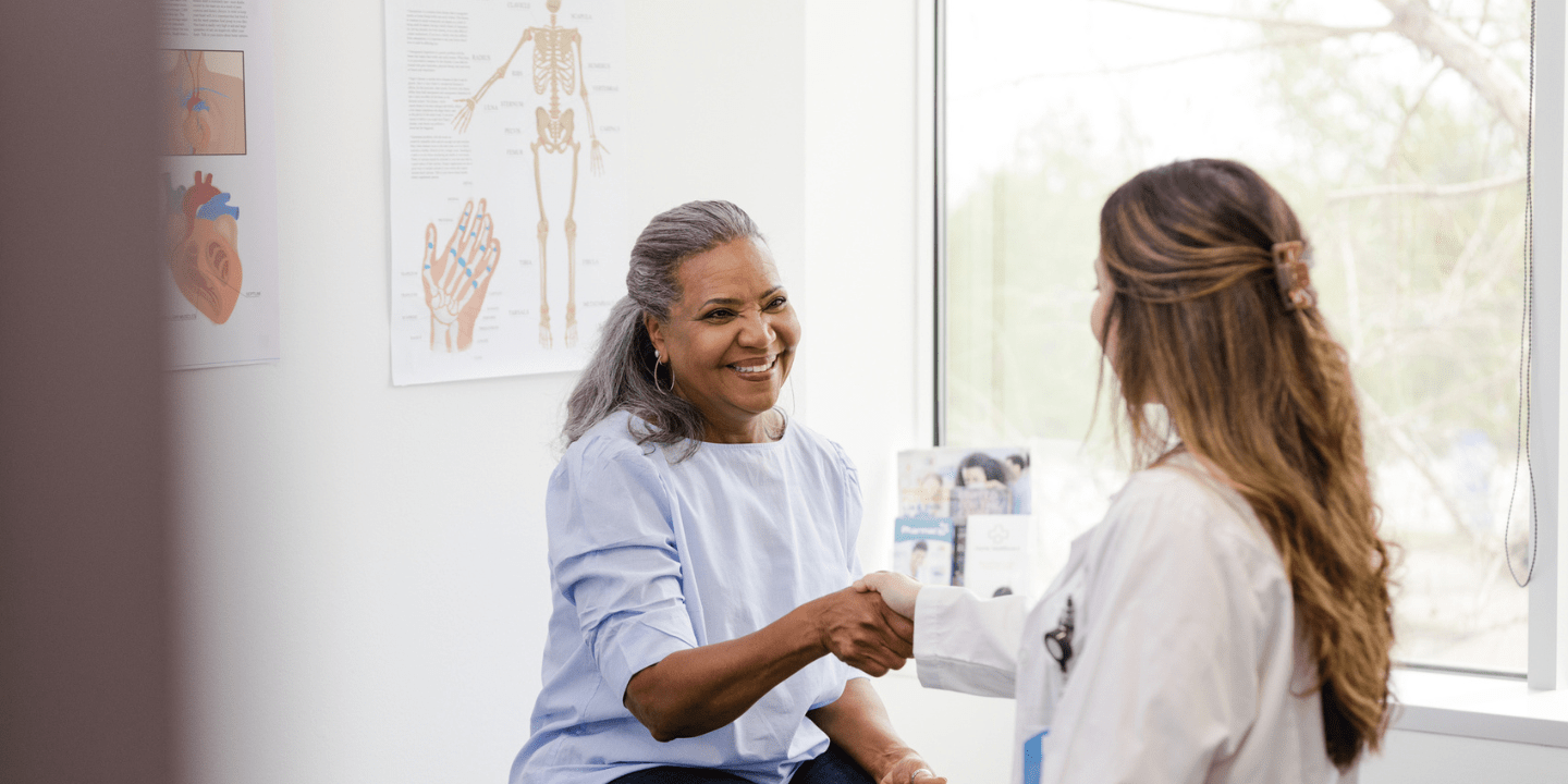 Provider and patient in exam room