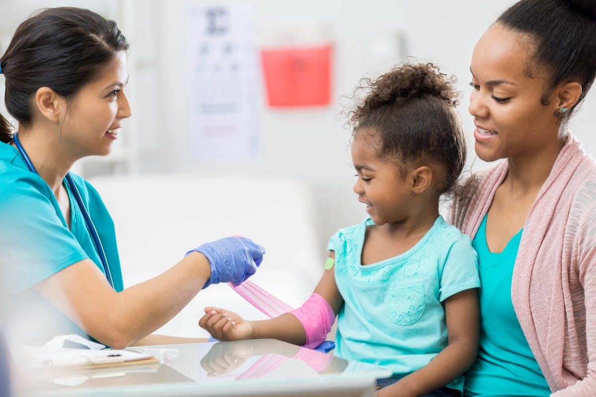 Doctor wrapping a wound