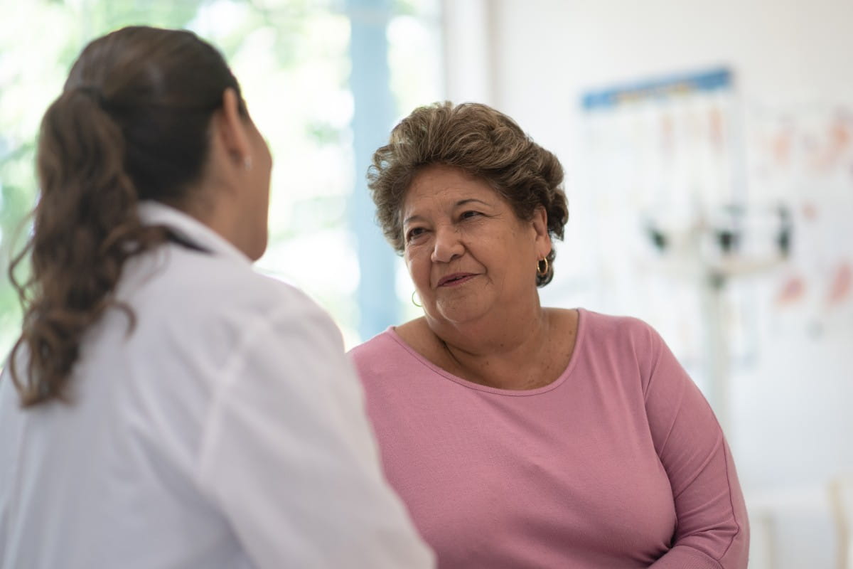 lady talking to her doctor