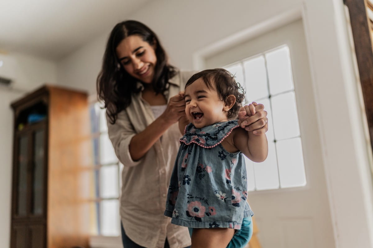 Mom with baby walking